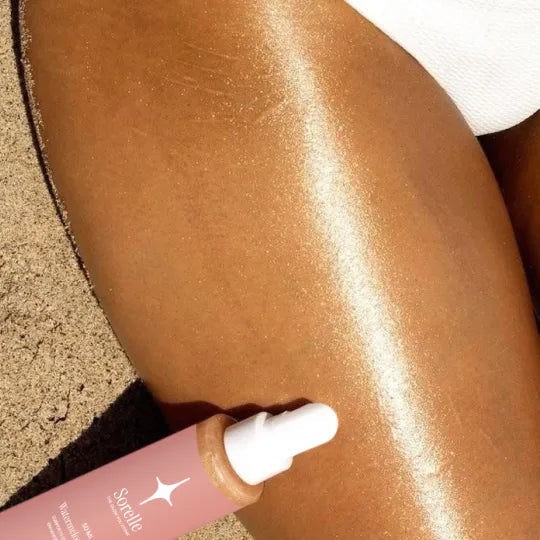 Sun-kissed skin with product bottle