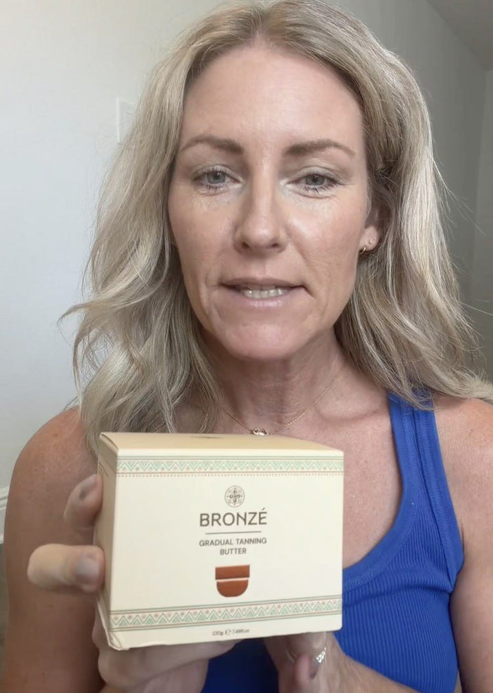 Illustrative image: a woman holding the BRONZÉ box (not the reviewer)